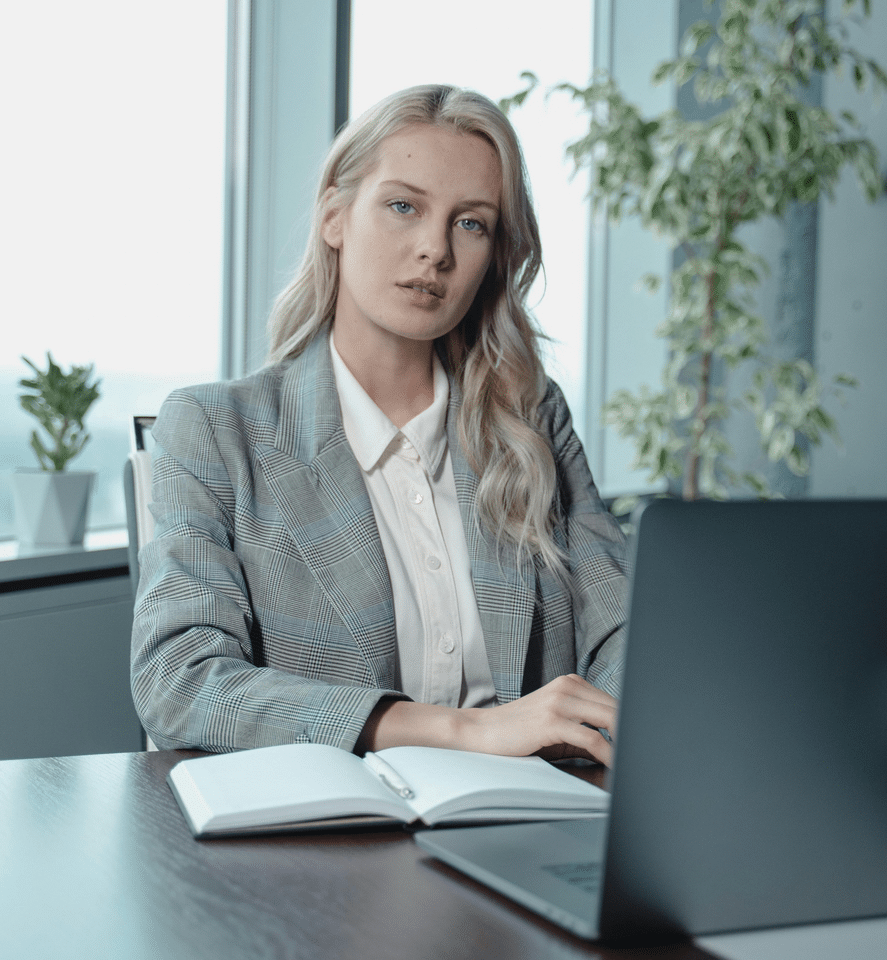 An ADHD counselling psychotherapist sat at her desk booking appointments.